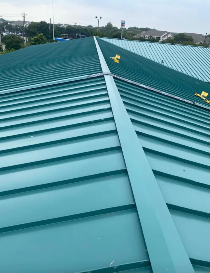 Green commercial metal roof ridge and valley for Metal Roof Repair in Leesburg